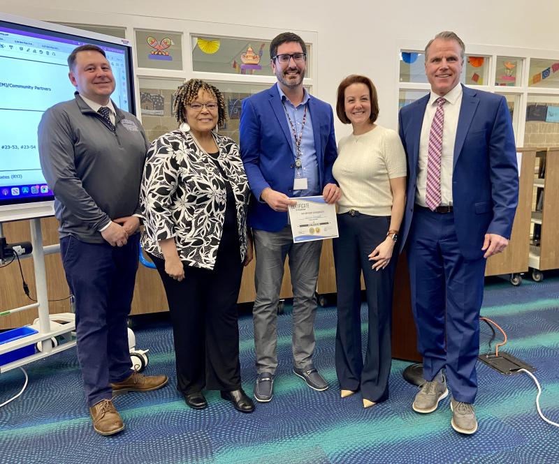 Rehoboth Elementary teacher Andy Granath was recognized by the Cape Henlopen school board Feb. 23. Gathered are (l-r) Rehoboth Elementary Assistant Principal Kevin Monaghan, Principal Doris Person, Granath, school board President Alison Myers and Superintendent Bob Fulton. ELLEN DRISCOLL PHOTOS